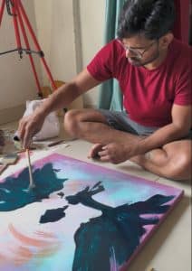 Working with fan brush on Echoes of Awakening an oil painting