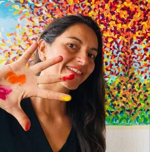Painting directly with my fingers allows me to translate emotions into strokes on the canvas